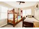 Bedroom featuring a built-in bunk bed and window seating at 609 Palmetto Blvd, Edisto Beach, SC 29438