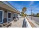 Relaxing deck with rocking chairs, overlooking the street at 609 Palmetto Blvd, Edisto Beach, SC 29438