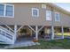 Underside view of beach house with picnic tables underneath at 609 Palmetto Blvd, Edisto Beach, SC 29438