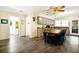 Kitchen and dining area with hardwood floors and ample space at 609 Palmetto Blvd, Edisto Beach, SC 29438