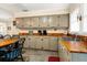 Bright kitchen with ample cabinets and wood countertops at 609 Palmetto Blvd, Edisto Beach, SC 29438