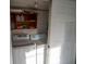 Laundry room with washer, dryer, and extra storage at 609 Palmetto Blvd, Edisto Beach, SC 29438