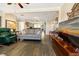 Open living space with hardwood floors and a view to the kitchen at 609 Palmetto Blvd, Edisto Beach, SC 29438