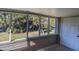 Relaxing screened porch overlooking lush backyard at 609 Palmetto Blvd, Edisto Beach, SC 29438