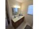 Bathroom with vanity, mirror, and tiled floors at 6884 Shahid Row, North Charleston, SC 29418