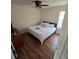 Bedroom with king-size bed and hardwood floors at 6884 Shahid Row, North Charleston, SC 29418
