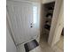 Front entry with closet, tiled floor, and stained-glass sidelight at 6884 Shahid Row, North Charleston, SC 29418