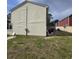 Side view of house showing tan siding and backyard at 6884 Shahid Row, North Charleston, SC 29418