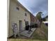 Tan exterior siding and small patio area at 6884 Shahid Row, North Charleston, SC 29418