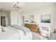 Spacious bedroom with plush seating, large bed, and plenty of natural light at 729 Opal Wing St, Moncks Corner, SC 29461