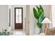 Bright entryway with hardwood floors and a view of the living room at 729 Opal Wing St, Moncks Corner, SC 29461