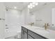 Bathroom boasts double vanity, bathtub and marble tile flooring at 733 Opal Wing St, Moncks Corner, SC 29461