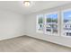 Bright bedroom with three windows and neutral carpeting at 733 Opal Wing St, Moncks Corner, SC 29461