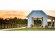 White pavilion with picnic tables overlooking a lake at 733 Opal Wing St, Moncks Corner, SC 29461
