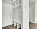 Built-in bench with cubbies and hooks in entryway at 733 Opal Wing St, Moncks Corner, SC 29461