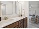 Double vanity bathroom with a modern design and upgraded finishes at 735 Opal Wing St, Moncks Corner, SC 29461