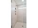 Clean and spacious shower with herringbone floor tile at 735 Opal Wing St, Moncks Corner, SC 29461