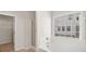 Bathroom with shower, tub, and closet at 767 Opal Wing St, Moncks Corner, SC 29461