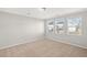 Bright bedroom with neutral walls and carpeted floors at 767 Opal Wing St, Moncks Corner, SC 29461