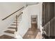 Bright entryway with hardwood floors and staircase at 767 Opal Wing St, Moncks Corner, SC 29461