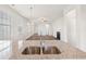 Kitchen features granite countertops and a view into the living room at 767 Opal Wing St, Moncks Corner, SC 29461