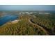 Community overview with lake and wooded areas at 775 Opal Wing St, Moncks Corner, SC 29461