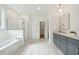 Spacious bathroom with soaking tub, walk-in shower, and double vanity at 775 Opal Wing St, Moncks Corner, SC 29461