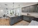 Eat-in kitchen features a large island and opens to the adjacent living area at 775 Opal Wing St, Moncks Corner, SC 29461