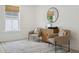 Cozy sitting area with two armchairs, rug, and a record player at 775 Opal Wing St, Moncks Corner, SC 29461