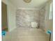 Bathroom with marble shower surround and double vanity at 815 Dunham St, Charleston, SC 29492