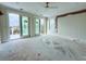 Main bedroom with access to a private deck and marsh views at 815 Dunham St, Charleston, SC 29492