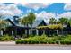 Community clubhouse with lush landscaping and a clock tower at 815 Dunham St, Charleston, SC 29492
