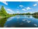Calm lake reflecting clouds and trees at 815 Dunham St, Charleston, SC 29492