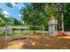 Community playground with play tower and swings at 815 Dunham St, Charleston, SC 29492