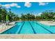 Community lap pool with lounge chairs and umbrellas at 815 Dunham St, Charleston, SC 29492