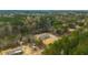 Aerial view showing two new homes nestled in a private wooded setting at 857 Devines Way, Cross, SC 29436