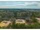 Aerial view of two new manufactured homes on wooded lots at 857 Devines Way, Cross, SC 29436