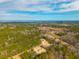 Wide aerial view of a community of new homes near a body of water at 857 Devines Way, Cross, SC 29436
