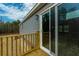 Wooden deck with sliding glass door access at 857 Devines Way, Cross, SC 29436