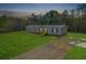 Single-wide manufactured home on a spacious lot with a wooden deck at 857 Devines Way, Cross, SC 29436