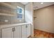 Laundry room with white cabinets and a countertop at 857 Devines Way, Cross, SC 29436