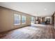 Open concept living room and kitchen with wood-look flooring at 857 Devines Way, Cross, SC 29436