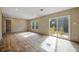 Living room with sliding glass doors to deck at 857 Devines Way, Cross, SC 29436