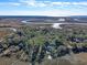 Aerial view of waterfront home with private dock and marsh views at 8934 Sandy Creek Rd, Edisto Island, SC 29438