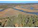 Aerial view of waterfront property with expansive marsh views and private docks at 8934 Sandy Creek Rd, Edisto Island, SC 29438