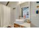 Bathroom with vessel sink, wooden vanity, and shower at 8934 Sandy Creek Rd, Edisto Island, SC 29438