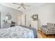 Charming bedroom featuring a comfortable bed, dresser, and seating area at 8934 Sandy Creek Rd, Edisto Island, SC 29438