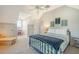 Bedroom with a metal bed frame and an eclectic decor at 8934 Sandy Creek Rd, Edisto Island, SC 29438