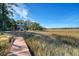 Wooden dock with access to waterfront property at 8934 Sandy Creek Rd, Edisto Island, SC 29438