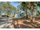 Cute cottage near palm trees and mature trees at 8934 Sandy Creek Rd, Edisto Island, SC 29438